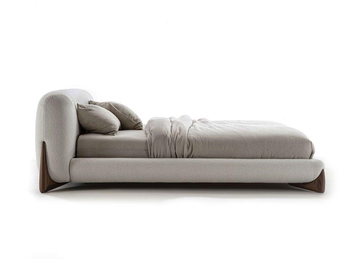 Luxury handcrafted headboard featuring sharp wooden support legs