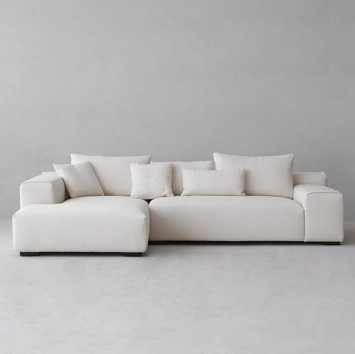 Modern Jasmine couch featuring sleek artisanal lines and premium upholstery