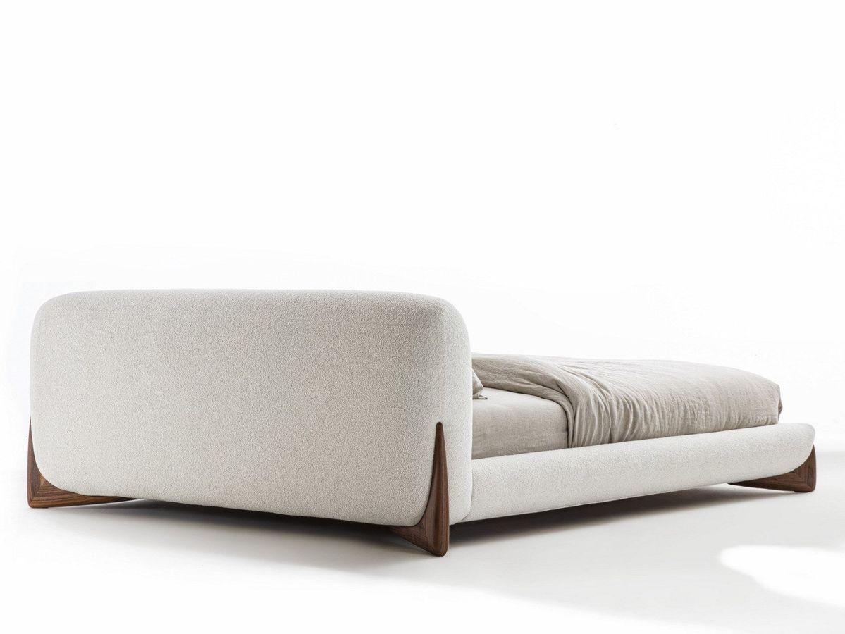 Modern artisanal headboard in a contemporary bedroom setting