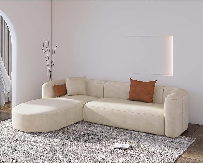 Luxury artisanal sofa with elegant curved arms and plush finish