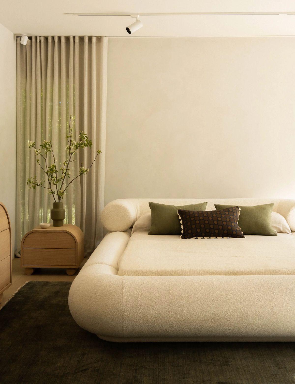 Exclusively designed Raoila headboard in a high-end bedroom setting