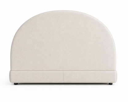 Whimsical designer chair with plush upholstery and refined finish