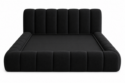 Bespoke fully upholstered bed set showing refined craftsmanship finish