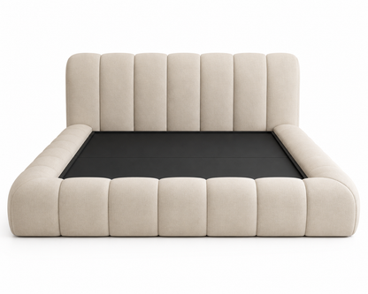 Luxury padded bed frame in a neutral minimalist bedroom setting