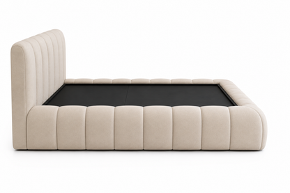 Luxury padded bed frame in a neutral minimalist bedroom setting