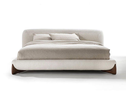 Close-up of the sturdy wooden leg detail on the Polada headboard