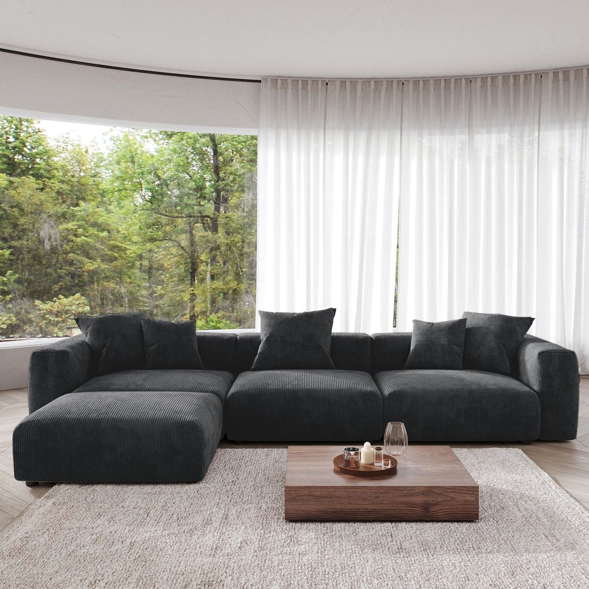 Luxury artisanal sectional sofa in a modern open-plan living room