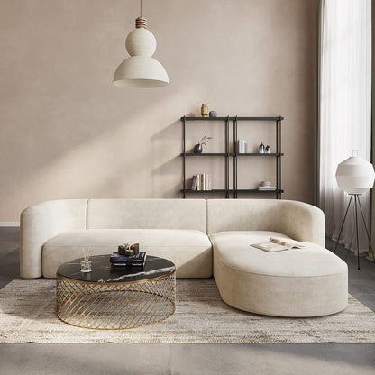 Modern Anat couch featuring a unique round day bed silhouette