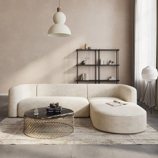 Modern Anat couch featuring a unique round day bed silhouette