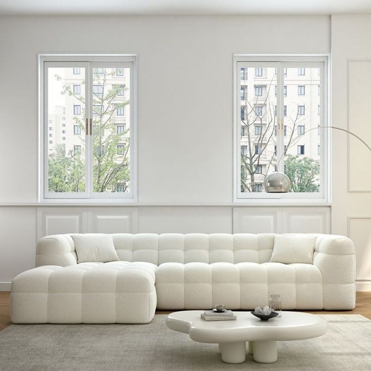 Luxury artisanal L-shaped sofa in a bright contemporary living room