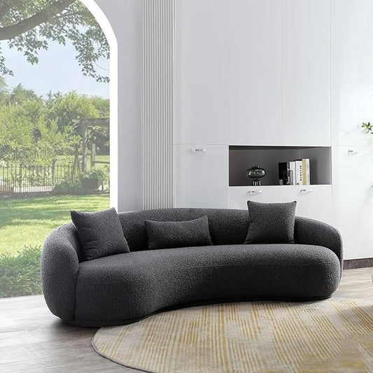 Modern Asante couch with a unique slanting curved silhouette