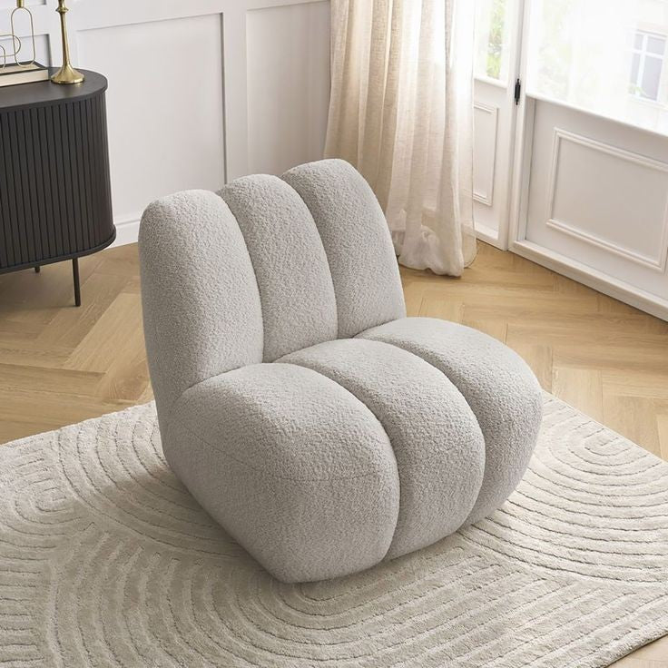 Elegant armless lounge chair showing refined craftsmanship and clean lines
