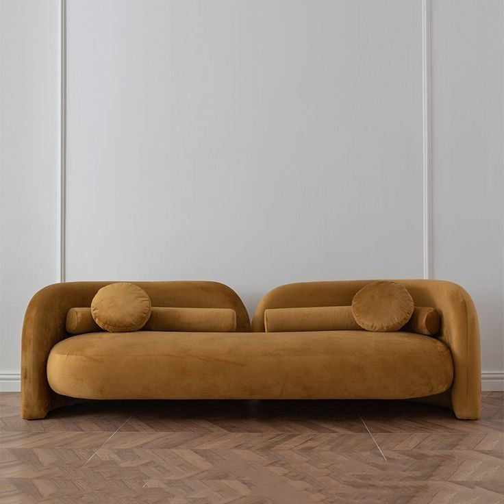 Luxury handcrafted sofa in a contemporary minimalist living room setting