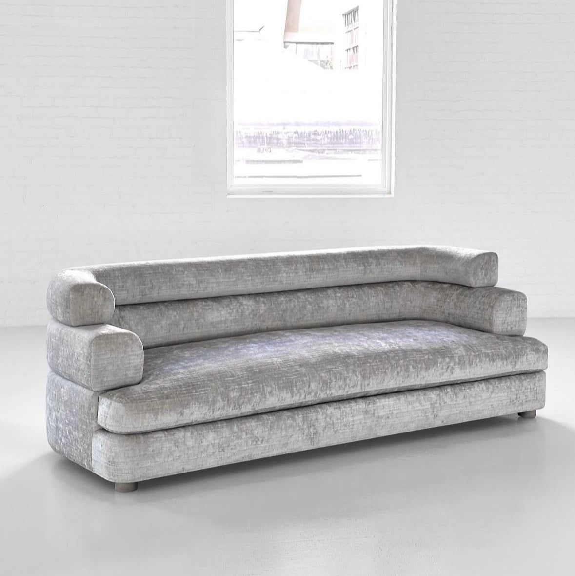 Modern Staeir couch featuring sleek artisanal lines and premium upholstery